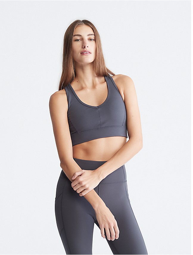 Calvin Klein Performance Women's Pilates Outfit Fitness Crop Top Scoopneck  Bra, Moonrock, X-Small at  Women's Clothing store