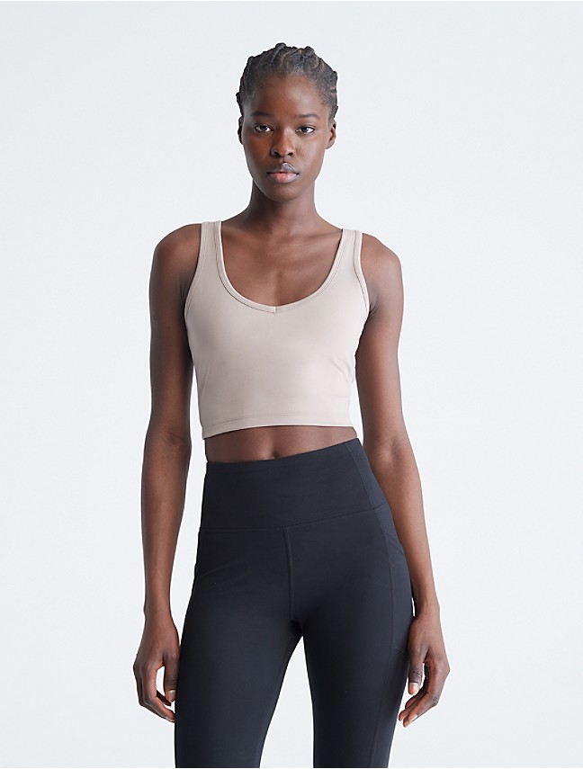 Calvin Klein Womens Medium Impact Round V-Neck Long Line Racerback Seamless  Sports Bra with Removable Cups : : Clothing, Shoes & Accessories