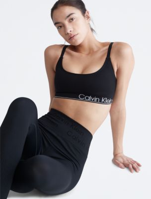 Calvin Klein Performance Strappy Back Logo Sports Bra (£20) ❤ liked on  Polyvore featuring activewear…