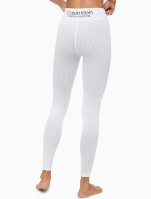 Calvin Klein performance leggings with big white letters down side of leg  Large