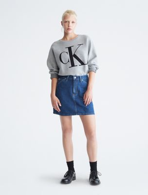 Calvin Klein - Our initials in pure form. The Monogram Logo Dolman Sleeve  Sweater is soft and classic. Plush cotton fleece in archival construction.  Shop now