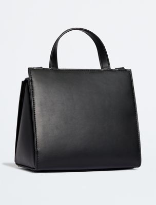 Calvin Klein Women's Elemental Curve Shoulder Bag in Black | Imported