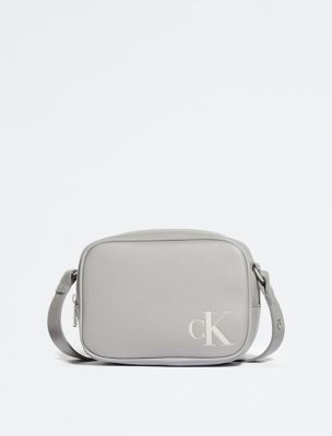 CALVIN KLEIN SHOULDER STRAP MINIMAL MONOGRAM CAMERA BAG Woman Pale