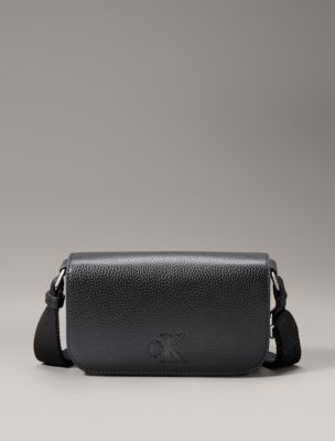 Buy Calvin Klein Sleek Micro Textured Crossbody Bag In Black
