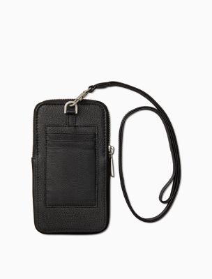 Calvin Klein MUST PHONE POUCH EMBOSSED - Phone case - black