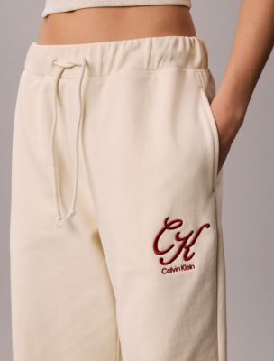 Женские брюки Calvin Klein Terry Script Logo Graphic Sweatpants, цвет: Turtledove — фото 3