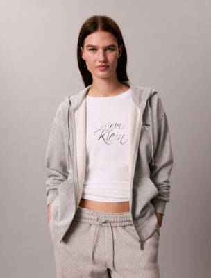 Женский лонгслив Calvin Klein облегающий с логотипом-надписью, цвет: Яркий белый — фото 4