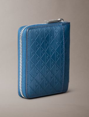 Мужской кошелёк Calvin Klein Embossed Allover Emblem Logo Zip Wallet, цвет: Океанский — фото 2