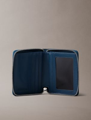 Мужской кошелёк Calvin Klein Embossed Allover Emblem Logo Zip Wallet, цвет: Океанский — фото 3