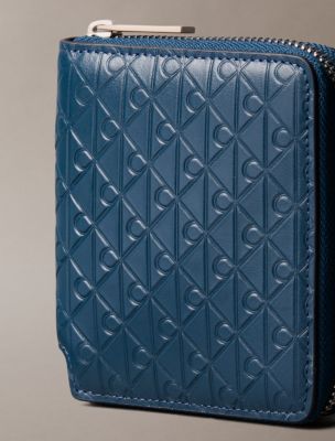 Мужской кошелёк Calvin Klein Embossed Allover Emblem Logo Zip Wallet, цвет: Океанский — фото 4