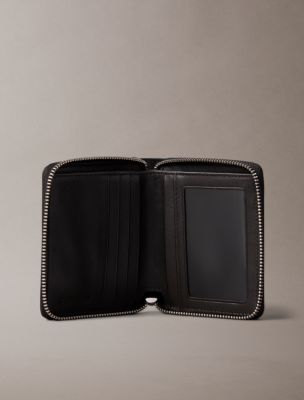 Мужские кошельки Calvin Klein Embossed Allover Emblem Logo Zip Wallet — фото 3
