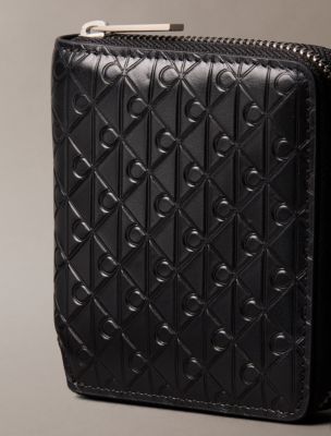 Embossed Allover Emblem Logo Zip Wallet | Calvin Klein