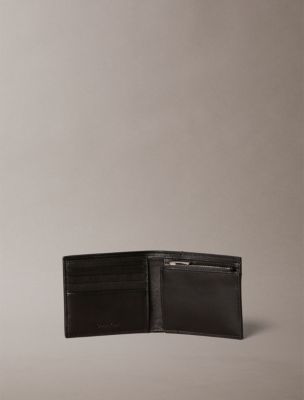 Мужские кошельки Calvin Klein Embossed Allover Monogram Bifold Wallet with Coin Pouch — фото 2