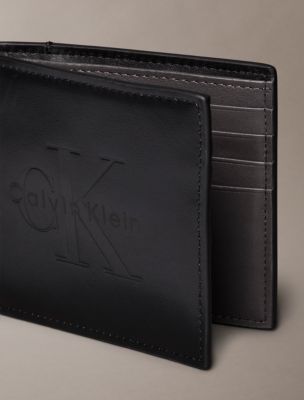 Мужские кошельки Calvin Klein Embossed Monologo Bifold Wallet — фото 3