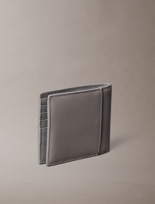 Мужские кошельки Calvin Klein Embossed Monologo Bifold Wallet with Coin Pouch — фото 2