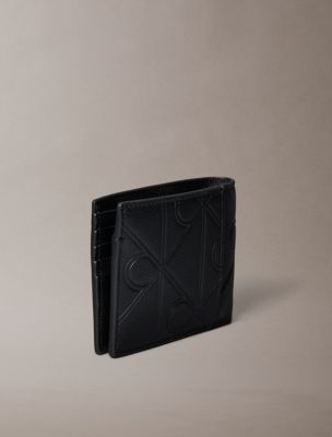 Мужские кошельки Calvin Klein Embossed Emblem Logo Bifold Wallet with Coin Pouch — фото 2