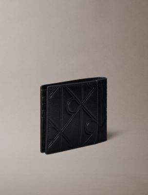 Мужские кошельки Calvin Klein Embossed Emblem Logo Bifold Wallet — фото 2