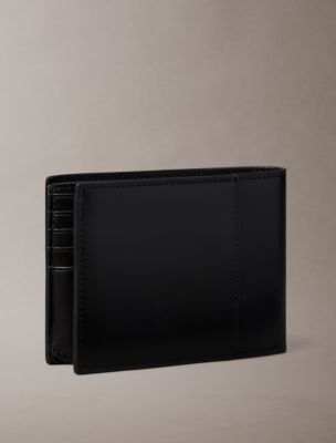 Мужские кошельки Calvin Klein Raised Logo Trifold Wallet — фото 2