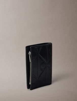 Мужские кошельки Calvin Klein Embossed Emblem Logo Slim Bifold Wallet — фото 2