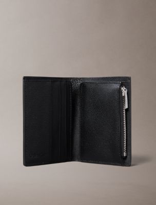 Мужские кошельки Calvin Klein Embossed Emblem Logo Slim Bifold Wallet — фото 3