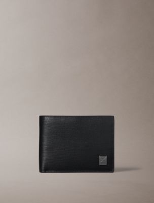 Мужской кошелёк Calvin Klein Emblem Logo Hardware Trifold Coin Wallet, цвет: Чёрный — фото 1