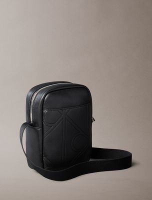 Мужские сумки Calvin Klein Allover Embossed Emblem Logo Slim Reporter — фото 2