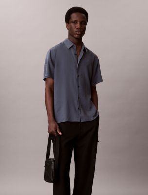 Мужские сумки Calvin Klein Allover Embossed Emblem Logo Slim Reporter — фото 5