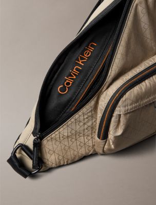 Мужская сумка Calvin Klein Allover Emblem Logo Utility Sling, цвет: Кешью — фото 3
