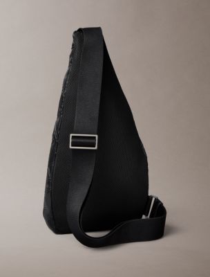 Мужская сумка Calvin Klein Debossed Allover Emblem Logo Sling, цвет: Чёрный — фото 2