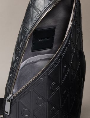 Мужская сумка Calvin Klein Debossed Allover Emblem Logo Sling, цвет: Чёрный — фото 3