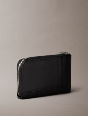 Женские кошельки Calvin Klein Embossed Allover Monogram Zip Wallet — фото 2