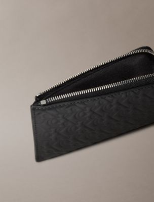 Женские кошельки Calvin Klein Embossed Allover Monogram Zip Wallet — фото 3
