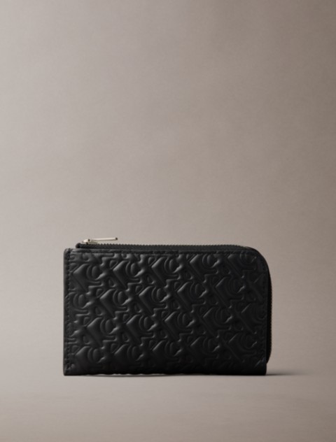 Женские кошельки Calvin Klein Embossed Allover Monogram Zip Wallet