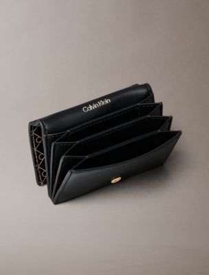 Женские кошельки Calvin Klein Allover Emblem Logo Accordion Card Case — фото 2
