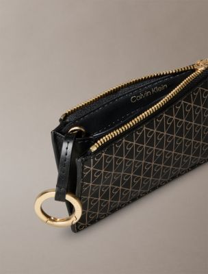 Женские кошельки Calvin Klein Allover Emblem Logo Top Zip Card Case — фото 3