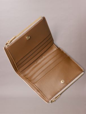 Женские кошельки Calvin Klein Foil Logo Top Zip Card Case — фото 3