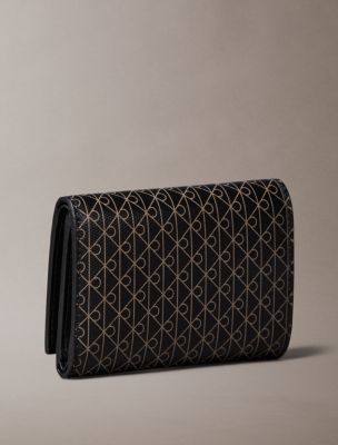 Женские кошельки Calvin Klein Allover Emblem Logo Trifold Wallet — фото 2