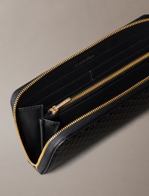 Женские кошельки Calvin Klein Emblem Logo Long Zip Wallet — фото 2