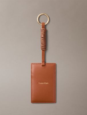 Женский кошелёк Calvin Klein Foil Embossed Logo Card Case Charm, цвет: Натуральный умбра — фото 1