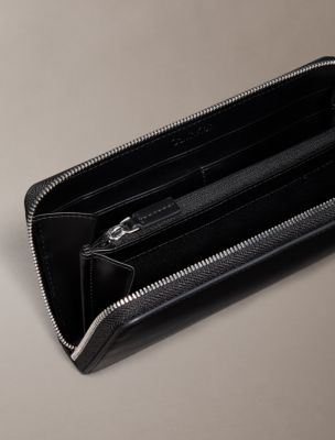 Женские кошельки Calvin Klein Signature Logo Strap Zip Wallet — фото 2