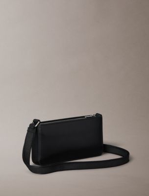 Женские аксессуары Calvin Klein Signature Logo Strap Zip Phone Crossbody — фото 2