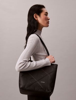 Женские сумки Calvin Klein Embossed Emblem Logo Small — фото 5