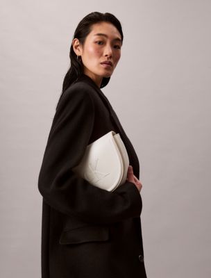 Embossed Monogram Saddle Bag | Calvin Klein