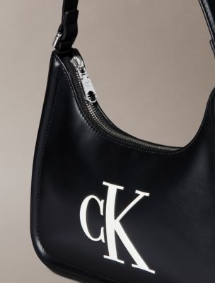Женские сумки Calvin Klein Embossed Monogram Shoulder — фото 4
