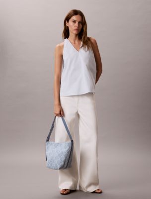 Женские сумки Calvin Klein Allover Emblem Logo Denim Bucket — фото 4