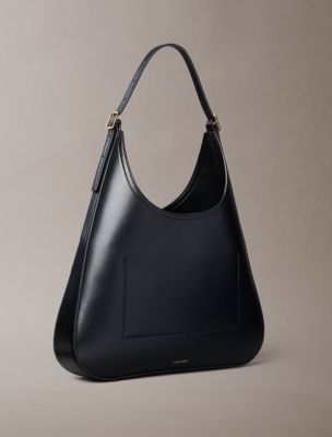 Женские сумки Calvin Klein Monogram Hardware Curved Shoulder — фото 2