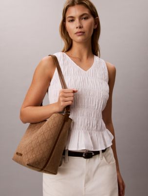 Женские сумки Calvin Klein Allover Emblem Logo Jacquard Bucket with Pouch — фото 4