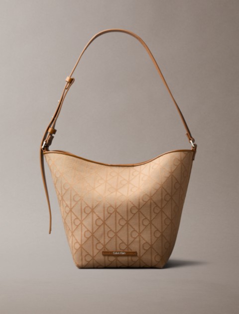Женские сумки Calvin Klein Allover Emblem Logo Jacquard Bucket with Pouch