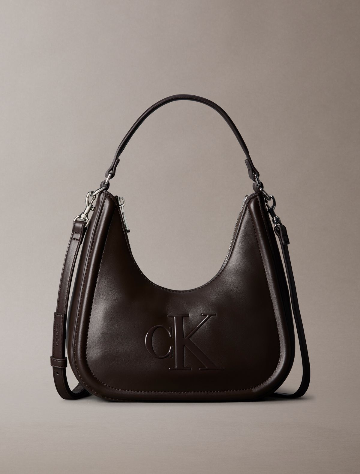 Embossed Monogram Crescent Bag