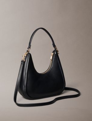 Женские сумки Calvin Klein Embossed Monogram Crescent — фото 2